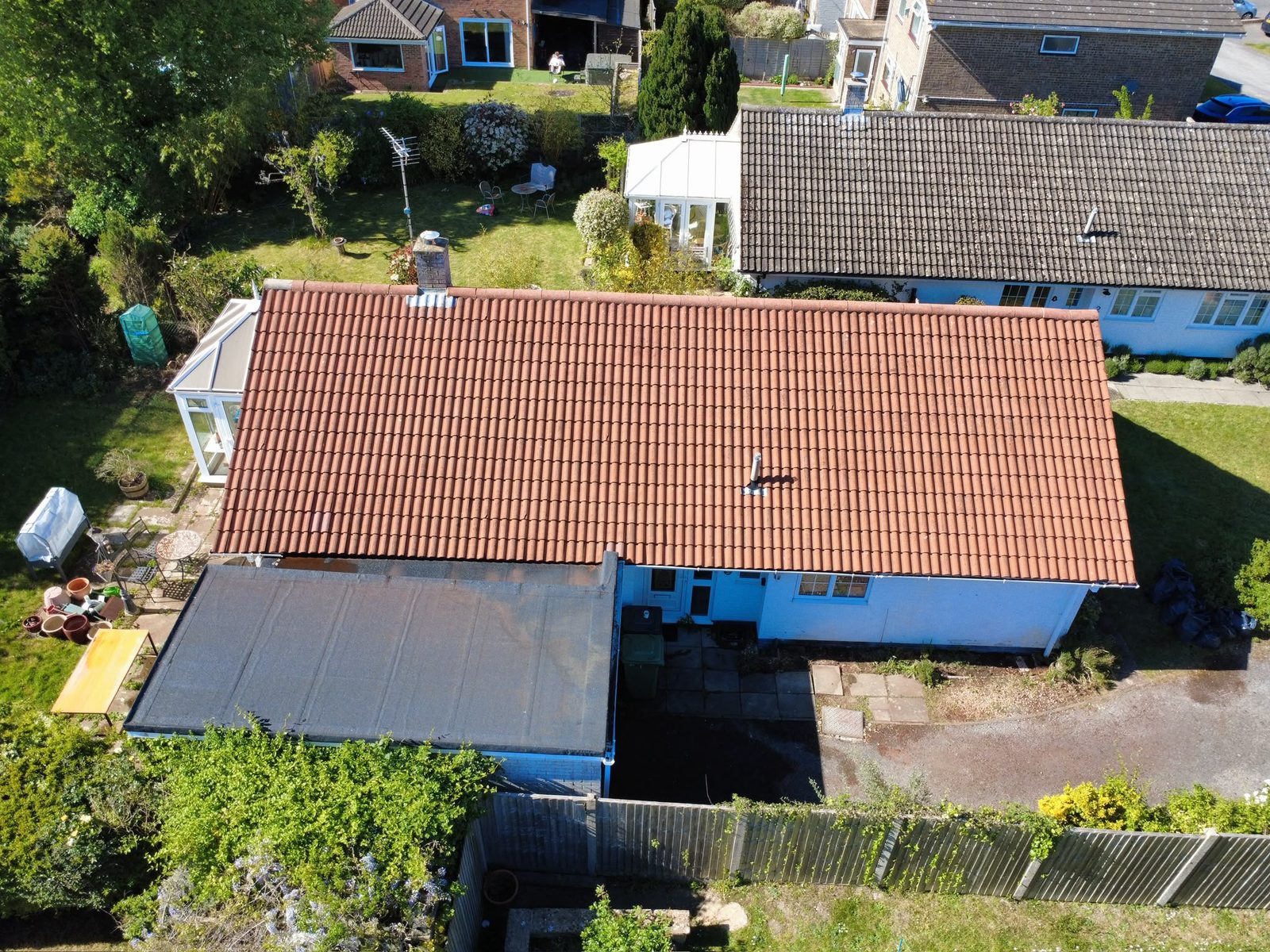 The property after cleaning &mdash; single-storey bungalow with concrete pantile roof