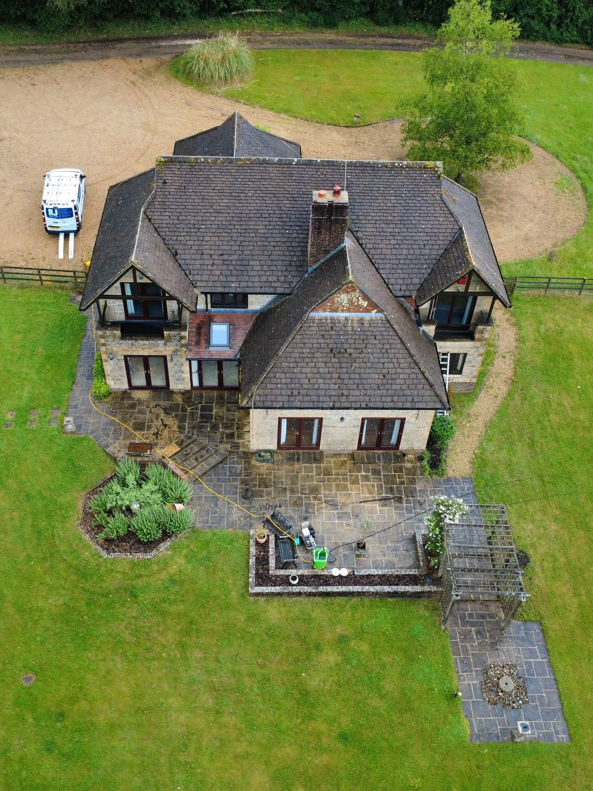 Aerial of a Hampshire executive property — clean tiled roof enhances kerb-appeal and appraised value