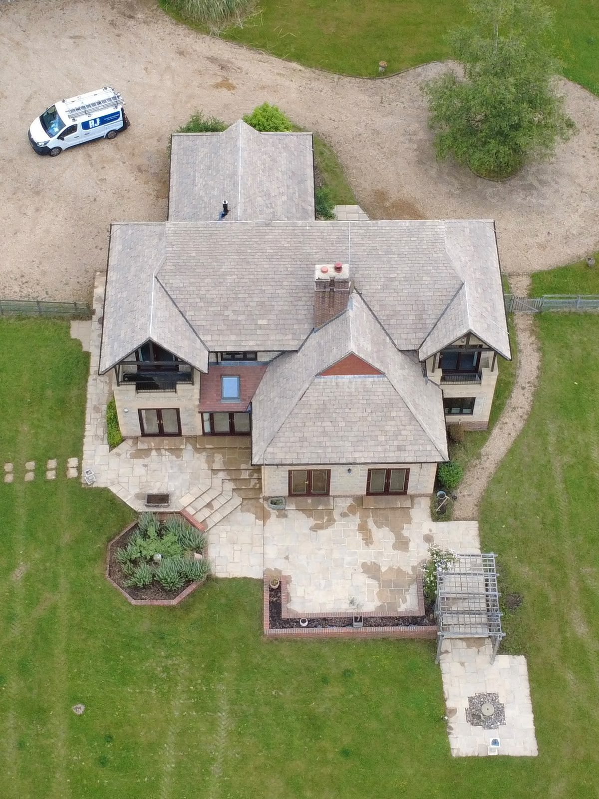 Aerial of a Fareham detached property — on-site partner van visible