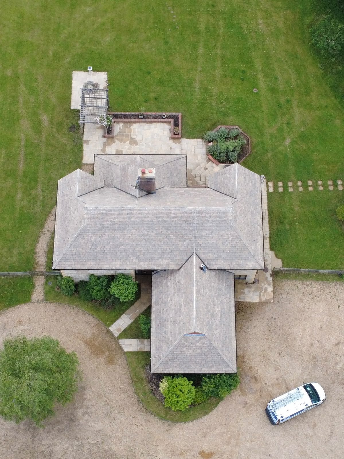 The property &mdash; period detached with natural slate roof, aerial view